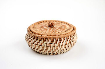 Wicker basket with lid on a white background, isolate, close-up