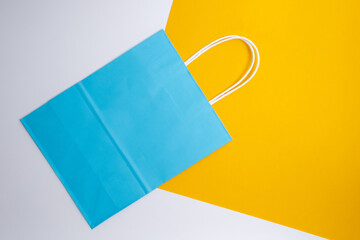 Kraft paper bag on a light background. Delivery and shopping concept. Packaging template mockup