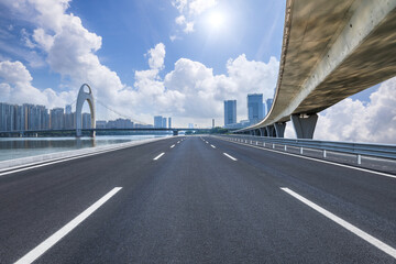Asphalt road and bridge with modern city skyline scenery in Guangzhou