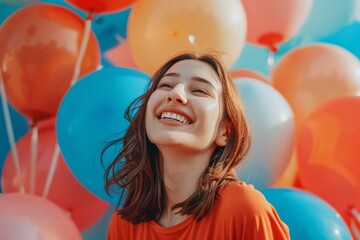 Obraz premium Woman with balloons smiling