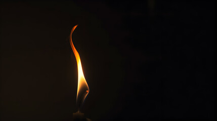 Close-Up of a Single Candle Flame in Darkness, Capturing the Warm Glow and Tranquil Atmosphere