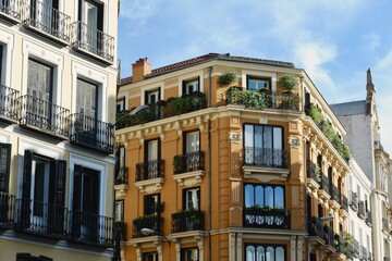 Fototapeta premium Classical vintage facades of different bright colours downtown Madrid, Chueca district, Spain