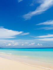 Obraz premium Beautiful beach with white sand, turquoise sea water and blue sky with clouds on a sunny day. Surgery. Natural background for summer vacation
