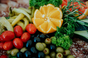 A beautifully arranged display of fresh fruits and desserts, showcasing vibrant colors and appetizing presentations, perfect for any special occasion