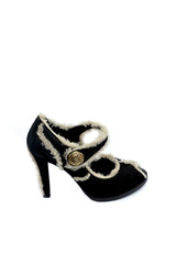Оne black suede women's shoe on a white background