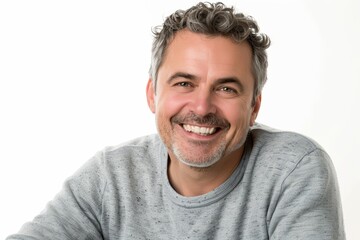 Fototapeta premium Portrait of a happy caucasian man in his 40s smiling at the camera isolated in white background