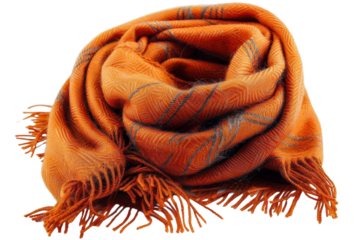A warm, orange scarf with a subtle pattern, folded neatly with tassels.  Perfect for autumn and winter fashion.