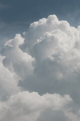 white thunderclouds in blue sky. summer cumulus clouds before rain. Beautiful view of nature and...