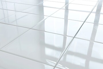 Fototapeta premium White tile floor background in perspective view. Clean, shiny symmetry grid line texture. Bathroom, kitchen and laundry room decor. Empty copy space for product display. Underfloor heating. Flooring