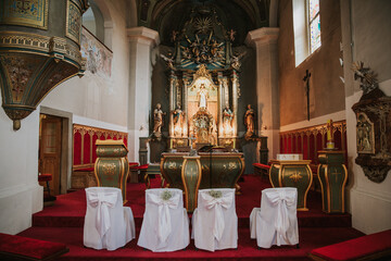 A beautifully adorned church interior, showcasing elegant decorations and a serene ambiance.