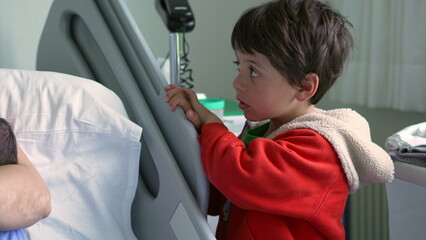 Big brother leaning on hospital bed, watching mother in pain, capturing the difficulties and emotional intensity of early motherhood in a hospital environment