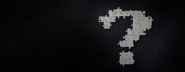 Puzzle question mark on dark background, concept for assessments, test, exam, quiz, puzzle, knowledge checks backgrounds, concept of help, concept of solution.