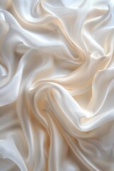 Obraz premium An abstract background with soft, waving white satin fabric creating a texture full of elegance and fluidity