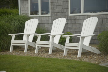 Three White Chairs