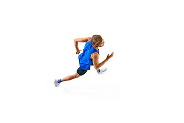 Dynamic and powerful image of athletic and focused man, runner in blue uniform in motion, running isolated on white background. Concept of sport, marathon, competition, healthy and active lifestyle