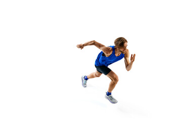 Young male, athlete in motion, highlighting intensity and focus of running, training isolated on white studio background. Concept of sport, marathon, competition, healthy and active lifestyle