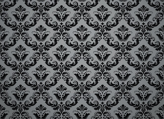 Wallpaper in the style of Baroque. Seamless vector background. Gray and black floral ornament. Graphic pattern for fabric, wallpaper, packaging. Ornate Damask flower ornament