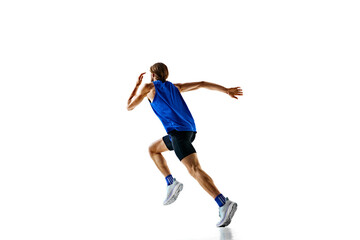 Focused and motivated young man, competitive athlete in motion, running, preparing for competition isolated on white background. Concept of sport, marathon, competition, healthy and active lifestyle