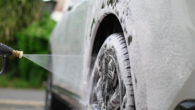 Slow Motion Video of a Car Washing Process on a Self-Service Car Wash
