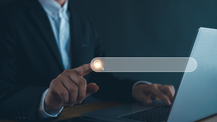 SEO Data Search Technology Search Engine Optimization.  search engine optimization, man's hand using laptop to search information, using search bar function on your website.
