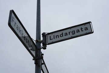 Fototapeta premium Reykjavik, Iceland - Lindargata and Frakkastigur crossing main street name sign in district Miðborg Austurbær