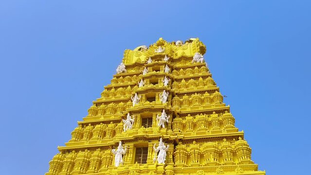 Chamundeshwari Temple is a Hindu temple located on the top of Chamundi Hills about 13 km from the palace city of Mysuru in the state of Karnataka in India. The temple was named after Chamundeshwari.	