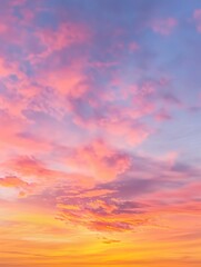 Fototapeta premium Pink and Orange Sunset Sky with Clouds