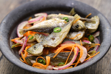 Small horse mackerel escabeche. Fried and marinated fish.
