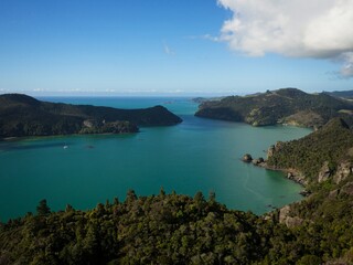 Blue ocean cliff hill panorama from Kaiaraara Rocks Dukes Nose Pekapeka Bay Whangaroa Harbour in Northland New Zealand