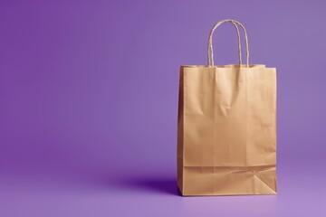 Paper shopping bag on purple background. Delivery concept.