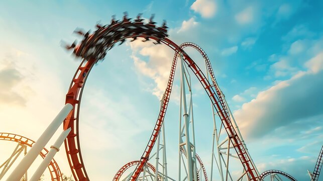 Roller coaster at the amusement park against blue sky