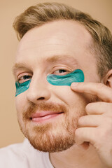 A stylish man with a eyepatches.