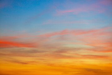 colorful clouds and sky,Dusk, Sunset Sky Clouds in the Evening with colorful Orange, Yellow, Pink and red sunlight and Dramatic storm clouds on Twilight sky, Landscape horizon