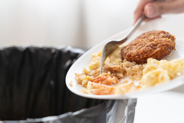 people put bio trash from food waste in domestic homes to compost bins to make fertilizer to reduce global environmental pollution.