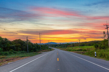 Roads and nature in Thailand,Concrete road and beautiful mountain scenery,Concrete road and beautiful mountain scenery,asphalt road in thailand