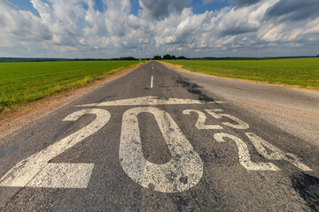 numbers 2024, 2025 on asphalt road highway. concept of destination in future, freedom, work start,...