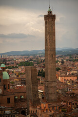 The Garisenda and Asinelli towers in Bolonia in all their glory under the blue sky
