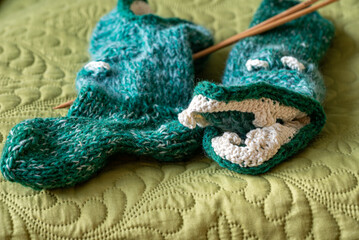 knitted socks, colored thread thread and needles, knitted in the Magic loop technique