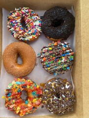 chocolate donuts with sprinkles