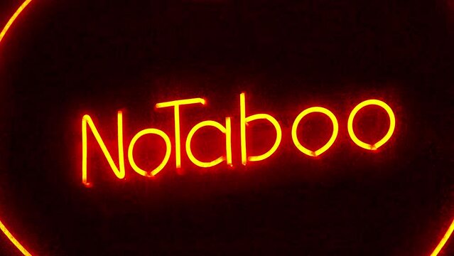 No Taboo inscription at sex shop window. Peccability and moral degradation of society, decline in morals
