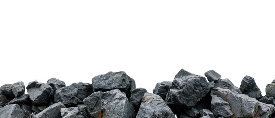 pile of dark, jagged rocks against a plain white background, perfect for themes related to geology, construction, and nature