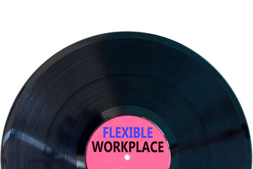 Flexible workplace symbol. Concept words Flexible workplace on beautiful purple black vinyl disk. Beautiful white paper background. Business Flexible workplace concept. Copy space.