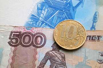 Russian ruble banknotes and coin