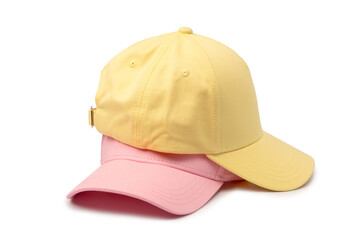 Fototapeta premium Pink and yellow cap isolated on white background.