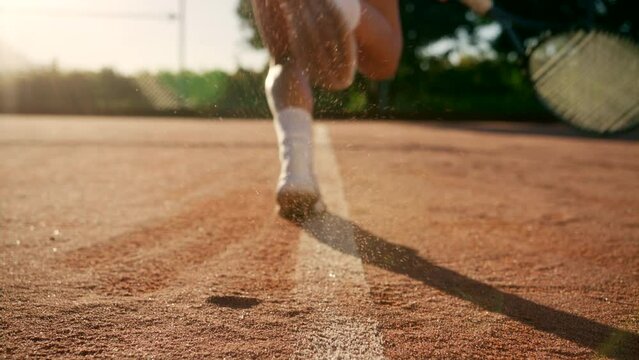 Woman Tennis Sliding and Hitting a ball
