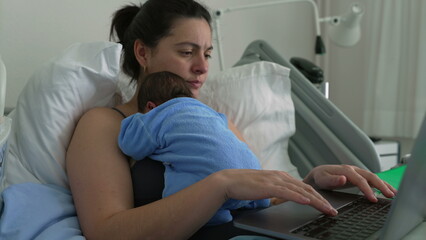 Mother in hospital bed with newborn baby, working on laptop, blending remote work and parenting,...