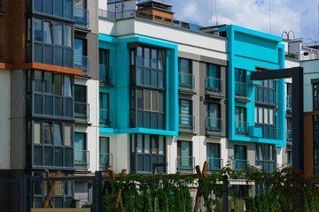 City view on a sunny day. Modern houses against the blue sky.