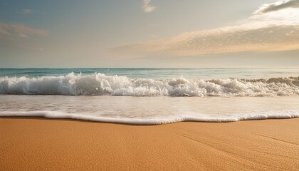 soft wave of sea on the sandy beach background