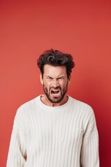 Obraz premium Angry Man Expressing Emotions Against Red Backdrop Generative AI