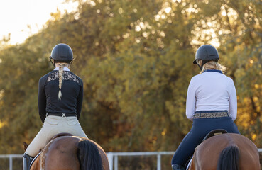 Horse trainer instructor equestrian student rider riding lessons